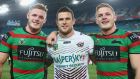 Tom Burgess (L) with brothers Luke and George. Photograph: Getty