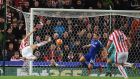 Stoke City  striker Marko Arnautovic scores the winning goal in the Premier League match against Chelsea at the Britannia Stadium. Photograph: Paul Ellis/AFP/Getty Images