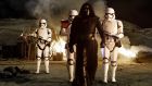 Star Wars: The Force Awakens. Kylo Ren (Adam Driver) with Stormtroopers. Photograph: David James/ Lucasfilm 2015