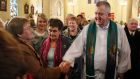 Fr Kevin Reynolds meeting with parishioners after Mass after he was welcomed back to his ministry in Saint Cuan’s Church in Ahascragh in 2011. It was fortunate for him that DNA testing cleared his name. Photograph: Joe O’Shaughnessy.