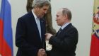 Russian president Vladimir Putin with US secretary of state John Kerry at the Kremlin in Moscow. Photograph: AFP Photo/ Sergei Karpukhin 