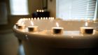 Run a bath and enjoy the atmosphere scented candles provide