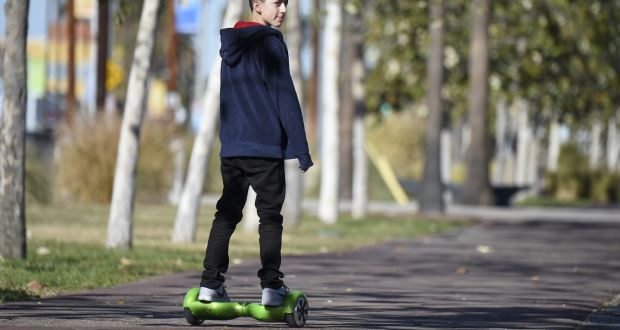 A hoverboard user in California. The  electronic skateboards that have captured the imagination of geeks recently have been dominated by dozens of off-brand companies.  