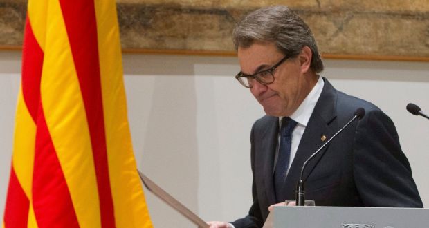 Artur Mas leaves a press conference at the Palau de la Generalitat in Barcelona on Saturday after announcing his resignation as Catalonia’s acting president. Photograph: Quique Garcia/EPA
