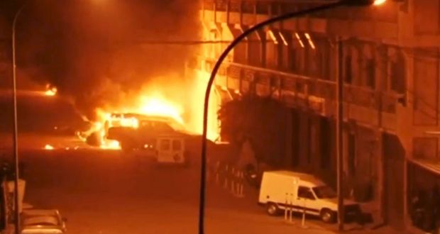 Vehicles on fire outside the Splendid Hotel in Ouagadougou, Burkina Faso during a siege by Islamist gunmen. Photograph: Reuters
