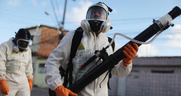 Health workers fumigate in an attempt to eradicate the mosquito which transmits the Zika virus on Thursday in Recife, Pernambuco state, Brazil. Zika was first confirmed in Brazil – a country of 200 million – last May, and it spread like wildfire Photograph:  Mario Tama/Getty Images