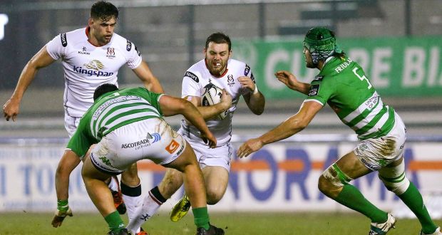 Ulster’s Darren Cave searching for space between Simone Ferrari and Tom Palmer of Treviso during the Guinness Pro 12 game at Stadio Comunale Monigo in Treviso. Photograph:  Matteo Ciambelli/Inpho