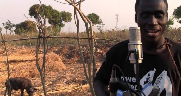 A member of the Malawi Mouse Boys being recorded by Ian Brennan in Malawi 
