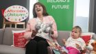 Tánaiste Joan Burton and Abi Boxshall (2), from Lucan, at the  launch of Standing Up For Families, Labour’s plan for quality and affordable childcare. Photograph: Gareth Chaney/Collins