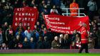 Liverpool fans protest against high ticket prices during the  FA Cup  match against West Ham at Upton Park. Photograph:  Clive Rose/Getty Images