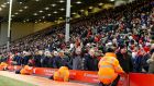 Liverpool fans leave the stands after 77 minutes during during last week’s Premier League match between Liverpool and Sunderland at Anfield in protest against the club’s plan to increase ticket prices. Photograph: Lindsey Parnaby/AFP/Getty Images