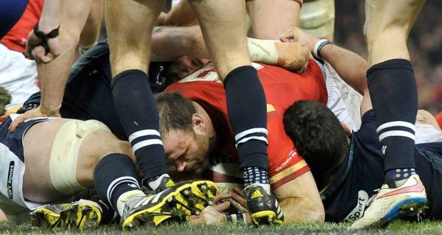 Man of the match  Jamie Roberts scores a try in the win against Scotland. Photograph: EPA