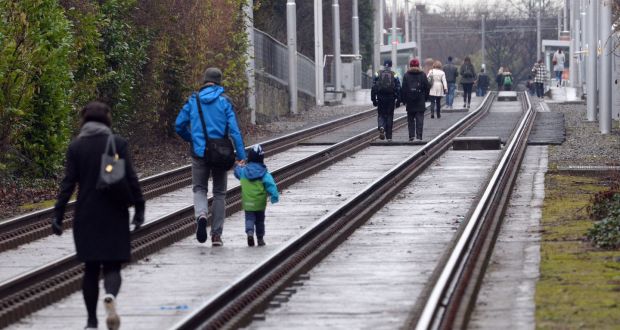 People walking the Luas line near Milltown during last Thursday and Friday’s strikes. Photograph: Cyril Byrne/The Irish Times