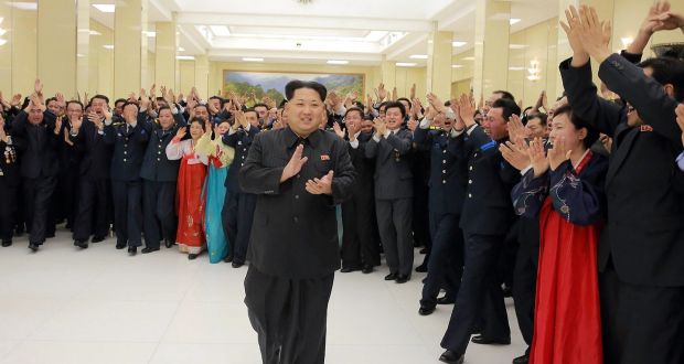 North Korean leader Kim Jong-un being welcomed during a party in Pyongyang for scientists who contributed to the launch of the earth observation satellite Kwangmyong. Photograph: AFP/Korean Central News Agency via KNS