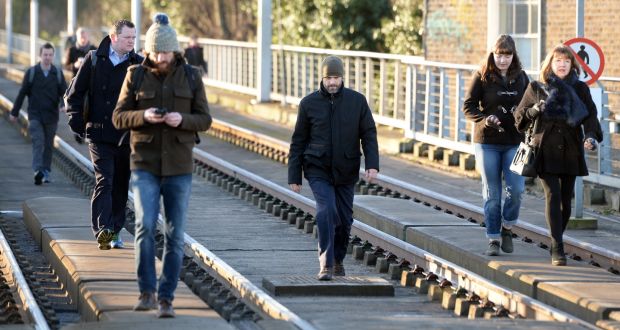Luas Strike Commuters take to the tracks and walk along the Luas line at Ranelagh.Photograph: Eric Luke / The Irish Times