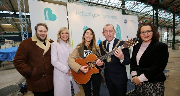 Pictured from left at the launch of ‘Belfast Goes To Market’ are  Belfast Lord Mayor Arder Carson, Jackie Henry (chair of Belfast Main Steering Group), Suzanne Wylie (chief executive Belfast City Council), with local musicians,  Dave Jackson (far left) and Fiona O’Kane (centre). Photograph: Aurora PA
