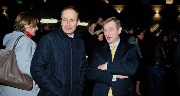 Micheal Martin TD leader of Fianna Fail and An Taoiseach Enda Kenny at the annual turning on of the Christmas Tree lights in Leinster House last December. Photograph: Aidan Crawley