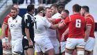 England’s prop Joe Marler  clashes with Wales’ prop Samson Lee at Twickenham. Photo: Getty Images