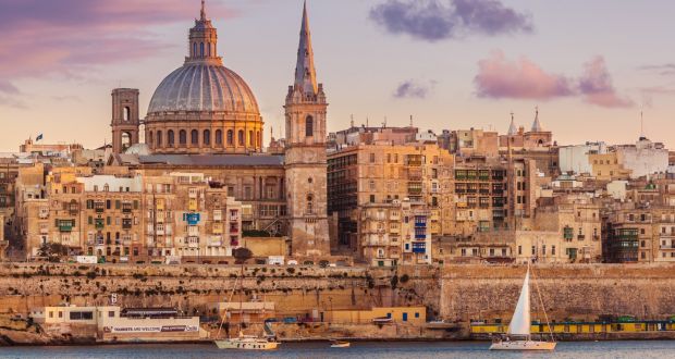 Valletta skyline at sunset with the Carmelite Church dome and St Paul’s cathedral. A world-heritage site, Unesco calls this time-warp city “one of the most concentrated historic areas in the world”