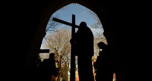 At St Finian’s Church on Adelaide Road, Dublin, at the end of an ecumenical Way of the Cross procession from Rathmines Catholic church. Photograph: Cyril Byrne / The Irish Times 