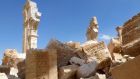 A general view taken yesterday shows part of the remains of the Arc de Triomph monument in Palmyra. Photograph: Al Mounes/AFP/Getty Images