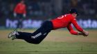 England’s captain Eoin Morgan dives to take a catch to dismiss New Zealand’s Ross Taylor in the  World Twenty20  semi-final at the Feroz Shah Kotla cricket ground  in New Delhi . Photograph:  Adnan Abidi/Reuters 