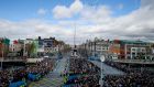 Reclaiming the streets: the Air Corps flying over O’Connell Street in advance of the Easter Sunday commemoration ceremony and parade. Photograph: Maxwells/Getty Images