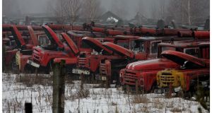 Chernobyl, 2006: Fire tenders dumped with other highly radioactive vehicles and helicopters used in the clean-up operation at reactor number 4. Photograph: Bryan O’Brien