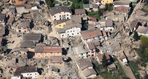 An aerial view of the destruction in the city of L’Aquila, central Italy, caused by the earthquake of April 2009. Photograph: AP/Italian Forestry Police Force