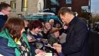 Liam Neeson signs autographs for fans as he arrives for the 2016 Irish Film and Drama awards at the Mansion House in Dublin. Photograph: Michael Chester/PA