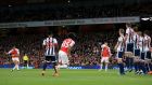 Arsenal’s Alexis Sanchez  scores his second  second goal with a free-kick during the  Premier League game against West Brom at  the Emirates Stadium.Photograph:  Nick Potts/PA Wire