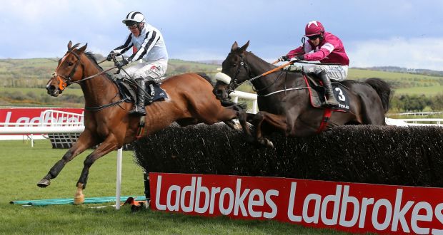 Bright New Dawn (right) ridden by jockey Bryan Cooper came from behind late on to win the Three.ie Handicap Chase during day three of the Punchestown Festival at Punchestown. Photo: Niall Carson/PA Wire