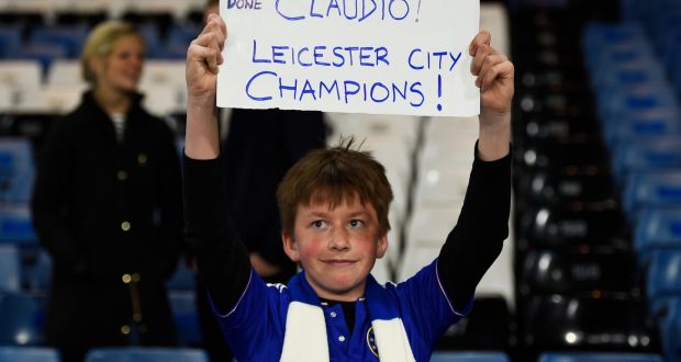 A Chelsea fan displays a banner in reference to Leicester City manager Claudio Ranieri. Photograph: Dylan Martinez/Reuters