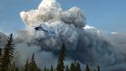 Alberta declared a state of emergency Wednesday as crews frantically held back wind-whipped wildfires. Photograph: Jason Franson /The Canadian Press via AP