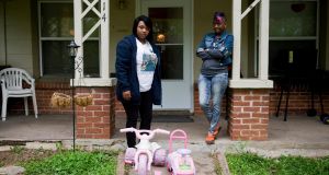 Montorre Kornegay (left) and her mother Pamala, in Kansas City, Missouri. Kornegay’s two-year-old Sha’Quille found her father Courtenay Block’s 9mm handgun under the pillow on his bed and shot herself in the head. Block now faces second-degree murder and child endangerment charges. Photograph: Daniel Brenner/The New York Times