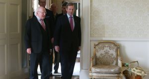 Newly elected Taoiseach Enda Kenny (right) with President Michael D Higgins at Áras an Uachtaráin on Friday night. Photograph: PA 