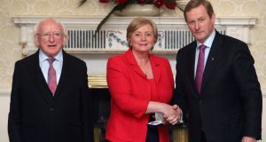 President Michael D Higgins (left) with  Minister for Justice Frances Fitzgerald and Taoiseach Enda Kenny, at Áras an Uachtaráin. Photograph: PA  