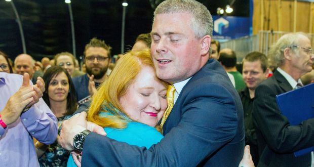 Naomi Long of the Alliance Party is congratulated by her husband Michael Long after being elected as MLA for Belfast East. Photograph: Liam McBurney/PA