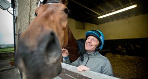 Kieren Fallon with a two-year-old filly from Fatal Attraction at the Curragh training grounds in Kildare. Photograph: Morgan Treacy/Inpho