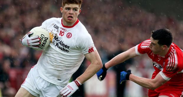 Tyrone’s Cathal McShane gives Derry’s Gareth McKinless the slip during the Ulster SFC quarter-final at Celtic Park. Photograph: Lorcan Doherty/Inpho/Presseye