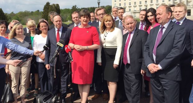 Arlene Foster and DUP colleagues speak to the media outside Parliament Buildings in Stormont, Belfast, as parties begin talks to form a new government following the assembly elections. Photograph: Press Association 