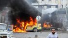 A blazing car after explosions hit the Syrian city of Tartous. Photograph: Syrian Arab News Agency handout via Reuters