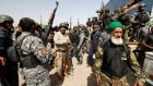 Shia militia and Iraqi government troops gather near Falluja, Iraq, on Tuesday. Photograph: Thaier Al-Sudani/Reuters.