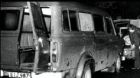 The bullet-riddled minibus which had been transporting the 11 Protestant workers who were gunned down as they lined up alongside the vehicle
