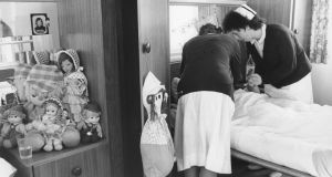 Views of St Ita’s Hospital, Portrane, in 1985: nurses lend a hand in the assessment ward. Photograph: Matt Kavanagh