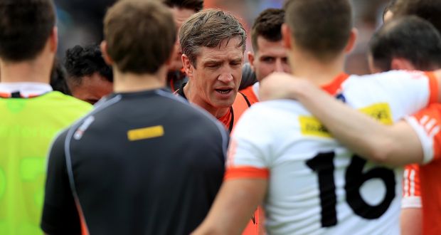 Armagh manager Kieran McGeeney with his players after the defeat to Cavan at Kingspan Breffni Park. Photograph: Donall Farmer/Inpho 