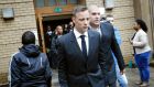 South African Paralympian Oscar Pistorius (L) leaves the Pretoria High Court after a sentencing hearing set to send him back to jail for murdering his girlfriend Reeva Steenkamp three years ago, in Pretoria on June 13th, 2016. Disgraced Paralympic athlete Oscar Pistorius is suffering from depression, anxiety and stress and is not able to testify at his sentencing for murdering his girlfriend, a psychologist told a South African court on Monday. Photograph: Marco Longarimarco/Getty Images/AFP   