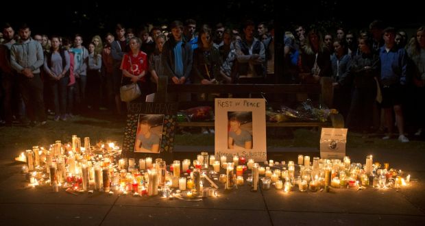 Young mourners, many J1 students, attend a candlelight vigil in Berkeley the night after the Irish students were killed when a balcony in an apartment collapsed during a party. Photograph: Beck Diefenbach/AP Photo