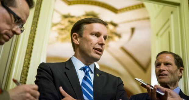 Democratic senator Chris Murphy  speaks to reporters after waging an almost 15-hour filibuster on the US Senate floor in order to force a vote on gun control. Photograph:  Pete Marovich/Getty Images