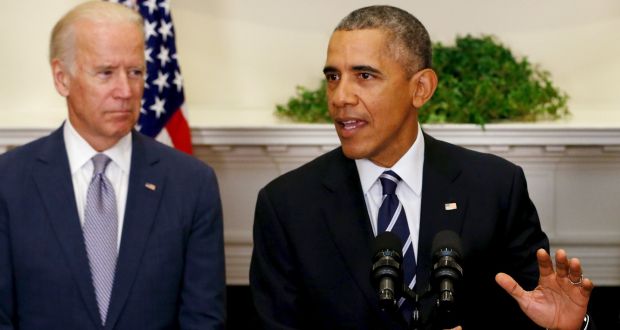 US vice-president Joe Biden flanks  President Barack Obama. Photograph: Reuters 